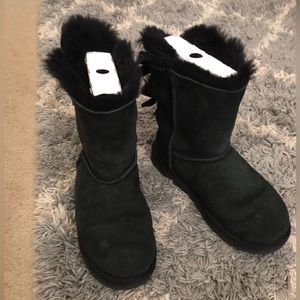 UGGS size 8 black with bows on back